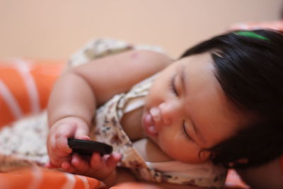 Midsection of woman using mobile phone