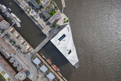 High angle view of buildings by river