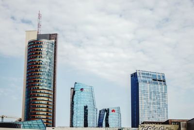 Low angle view of skyscraper against sky