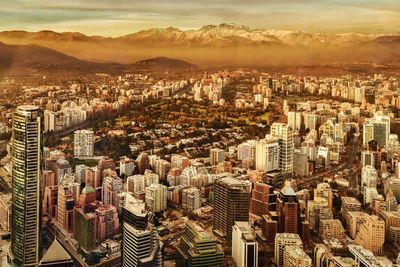 High angle view of modern buildings in city against sky