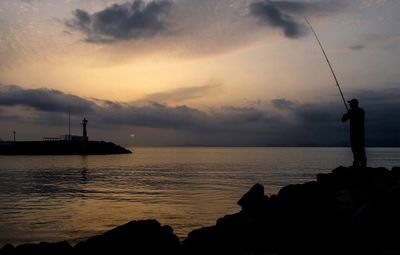 Scenic view of sea at sunset