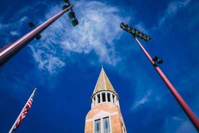 Low angle view of tower against blue sky