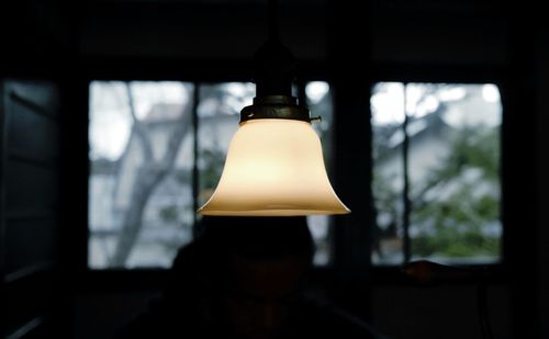 Close-up of illuminated light bulb