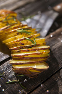 High angle view of potatoes on wooden table