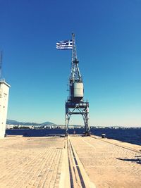 Crane against clear blue sky