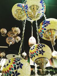 Close-up of decorations hanging for sale