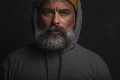 Close-up portrait of man wearing mask