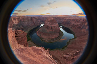 Scenic view of landscape seen through glass