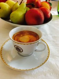 Close-up of fruits in plate on table