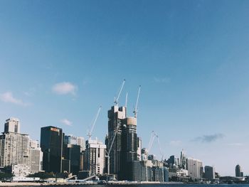 Modern cityscape against sky