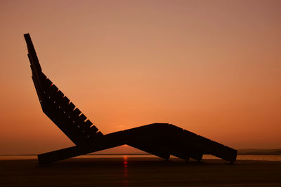 Low angle view of silhouette against sky during sunset