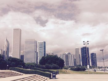 Modern buildings in city against sky