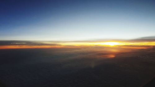 Scenic view of landscape against sky during sunset