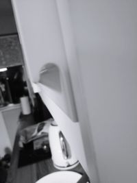 Close-up of white bathroom on table