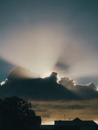 Low angle view of silhouette mountain against sky during sunset