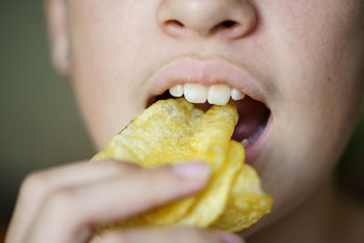 Close-up of woman eating food