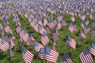 High angle view of flags in cemetery