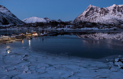 Scenic view of frozen lake against clear sky