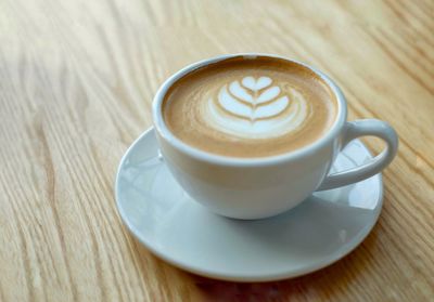 Close-up of cappuccino on table