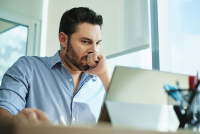 Man working on table