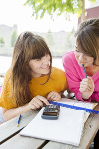 Teenage girls studying, sweden