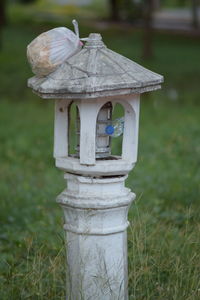 Close-up of stone structure on field