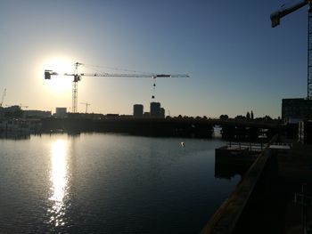 Scenic view of river against sky during sunset