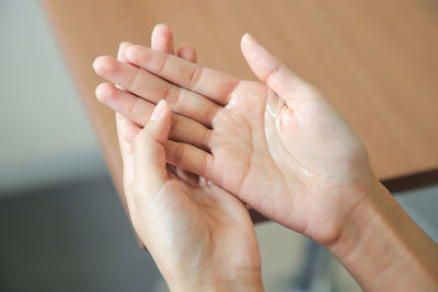 Close-up of hands holding baby feet