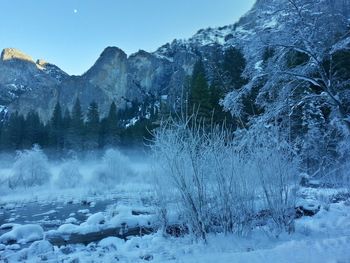 Scenic view of snow covered mountains