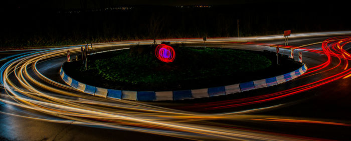 High angle view of light trails on road