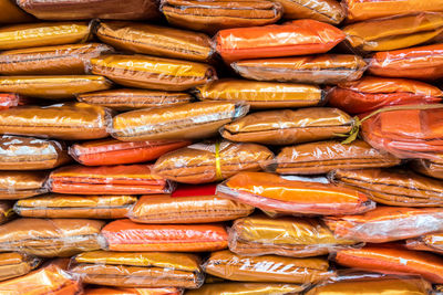 New tri-cloth stock wrapped in plastic for the preparation of offerings to the monks