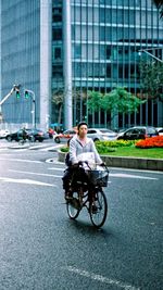 Man riding motorcycle on road