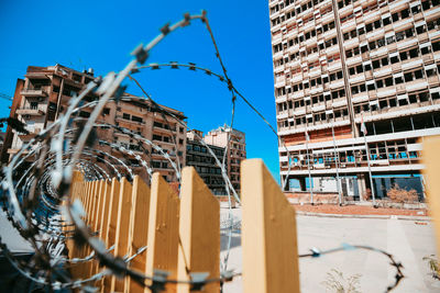 Buildings against blue sky in city