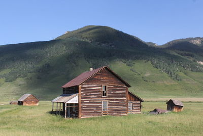 House on field against sky