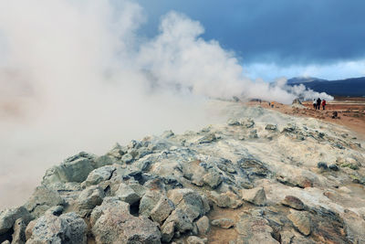 Panoramic view of rock formations against sky