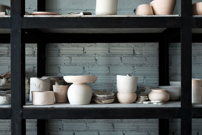 View of bowls on shelf