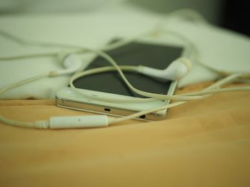 Close-up of smart phone on table