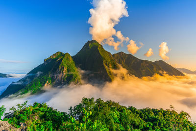 Panoramic view of mountains against sky during sunset