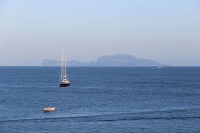 Boat sailing in sea