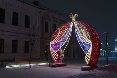 Illuminated building at night