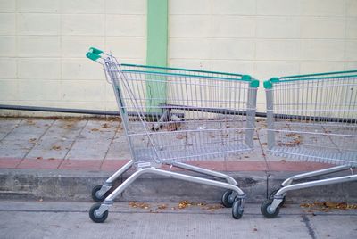 Empty shopping carts on road