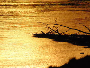 Scenic view of sea at sunset