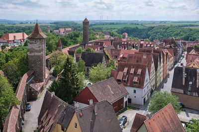 High angle view of townscape against cloudy sky