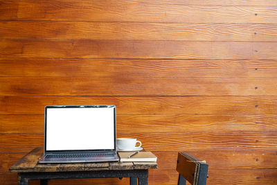 Low angle view of laptop on table