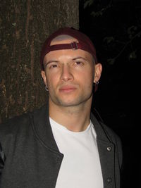 Portrait of young man standing outdoors
