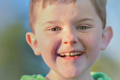 Close-up portrait of smiling boy