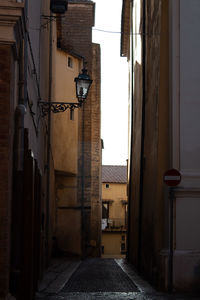 Street amidst buildings in italian city