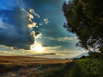 Scenic view of landscape against sky during sunset