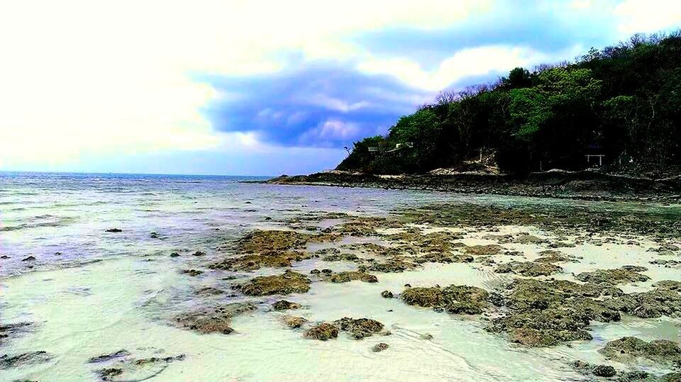 water, sky, sea, tranquil scene, beach, tranquility, scenics, beauty in nature, horizon over water, shore, nature, tree, cloud - sky, sand, rock - object, idyllic, coastline, cloud, cloudy, outdoors