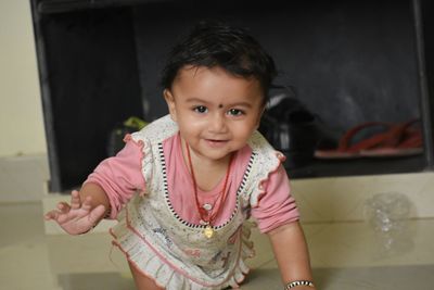 Portrait of cute girl at home